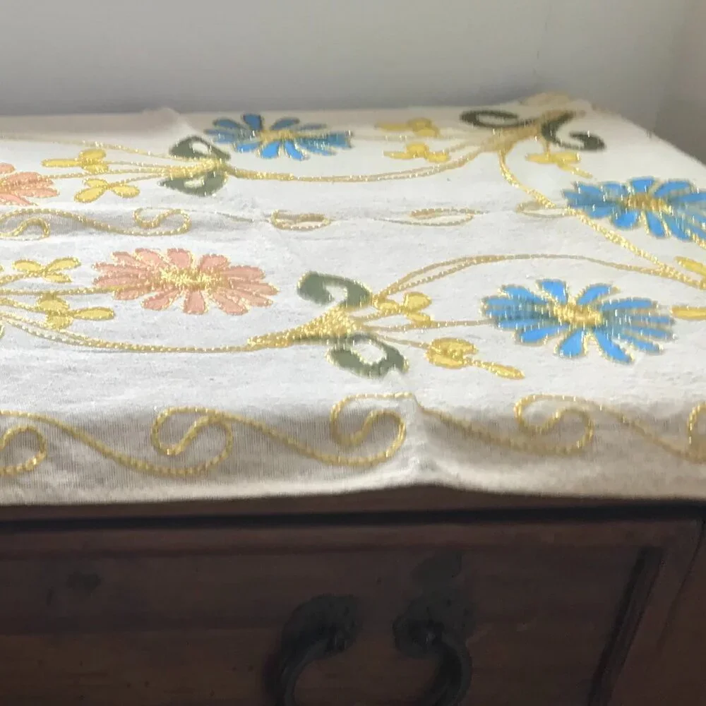 Decorative Turkish table runner with vibrant floral design.